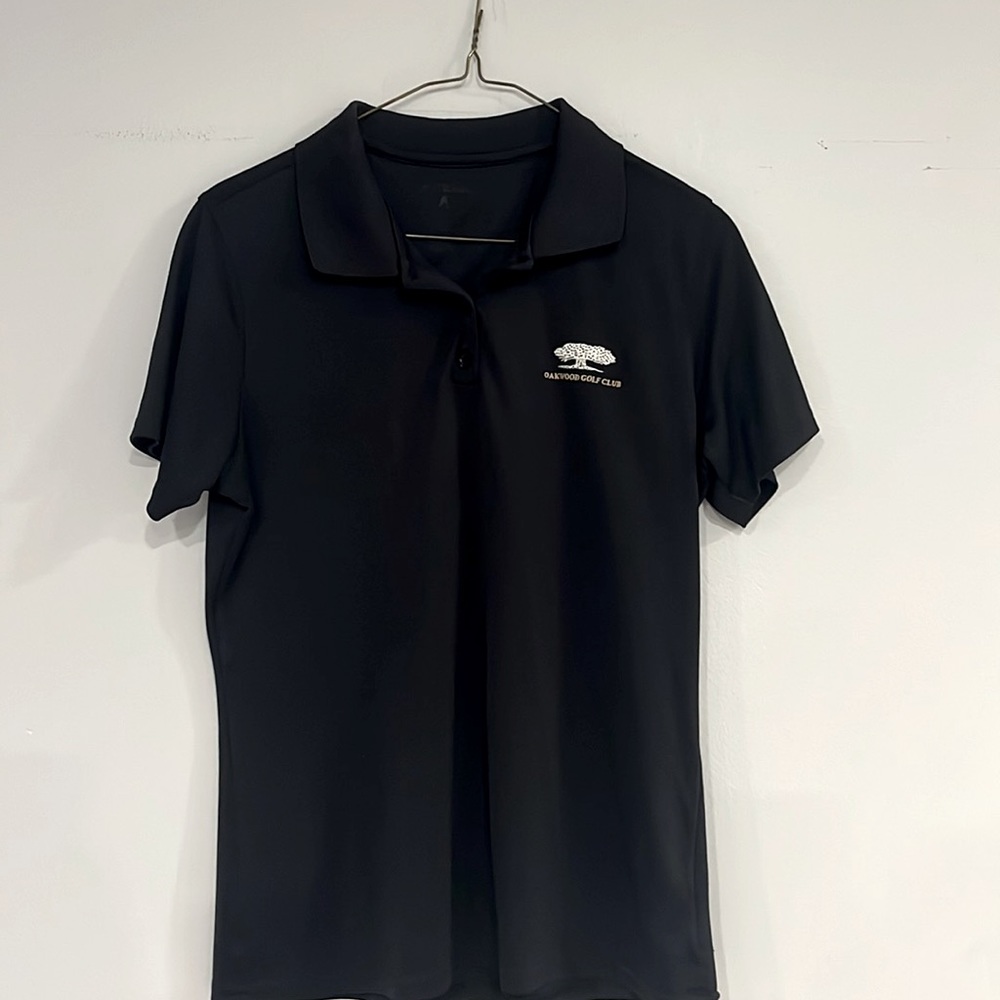Ladies Navy Antigua golf polo.